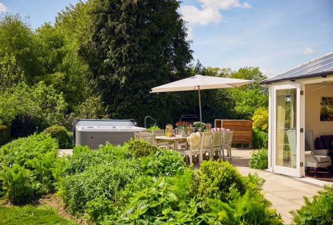 Pendennis: large, accessible patio off the conservatory sitting room